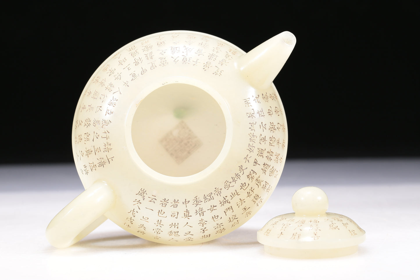 A Brilliant White Jade 'Poem' Teapot With Four Miniature Teacups