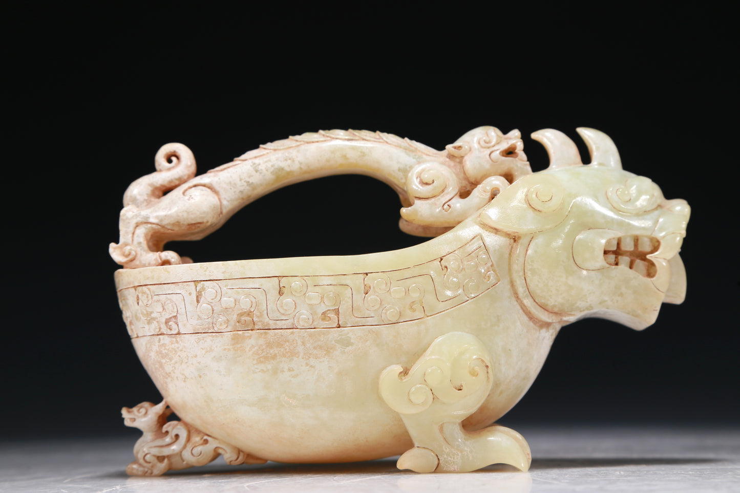 A Marvelous White Jade 'Auspicious Beast' Ewer