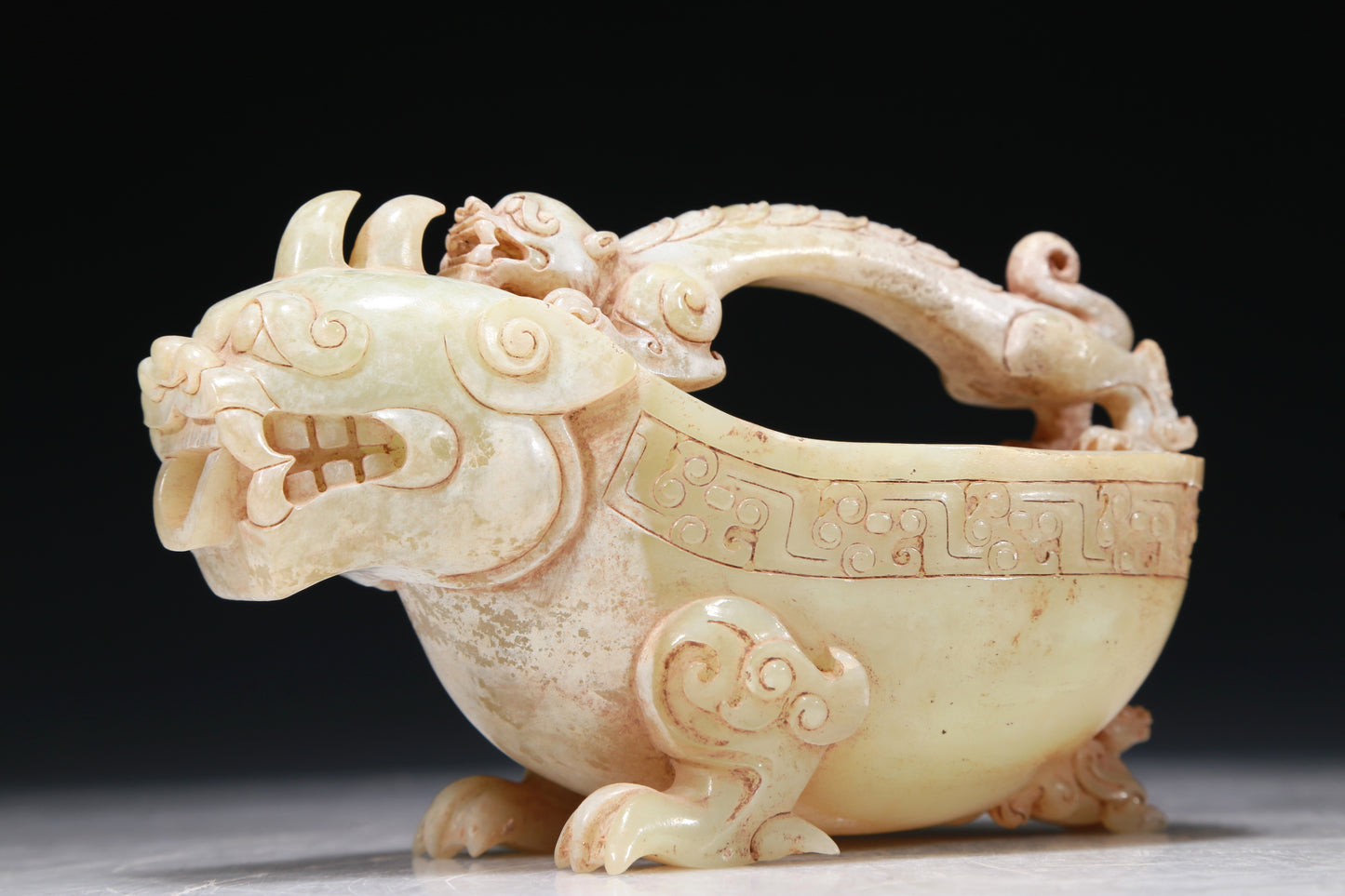 A Marvelous White Jade 'Auspicious Beast' Ewer