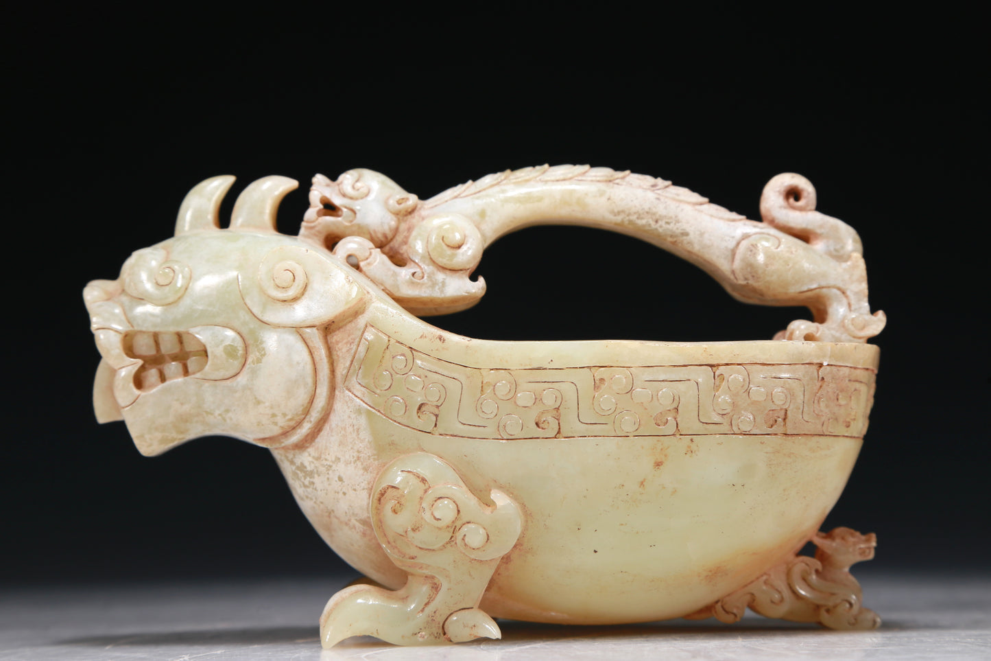 A Marvelous White Jade 'Auspicious Beast' Ewer