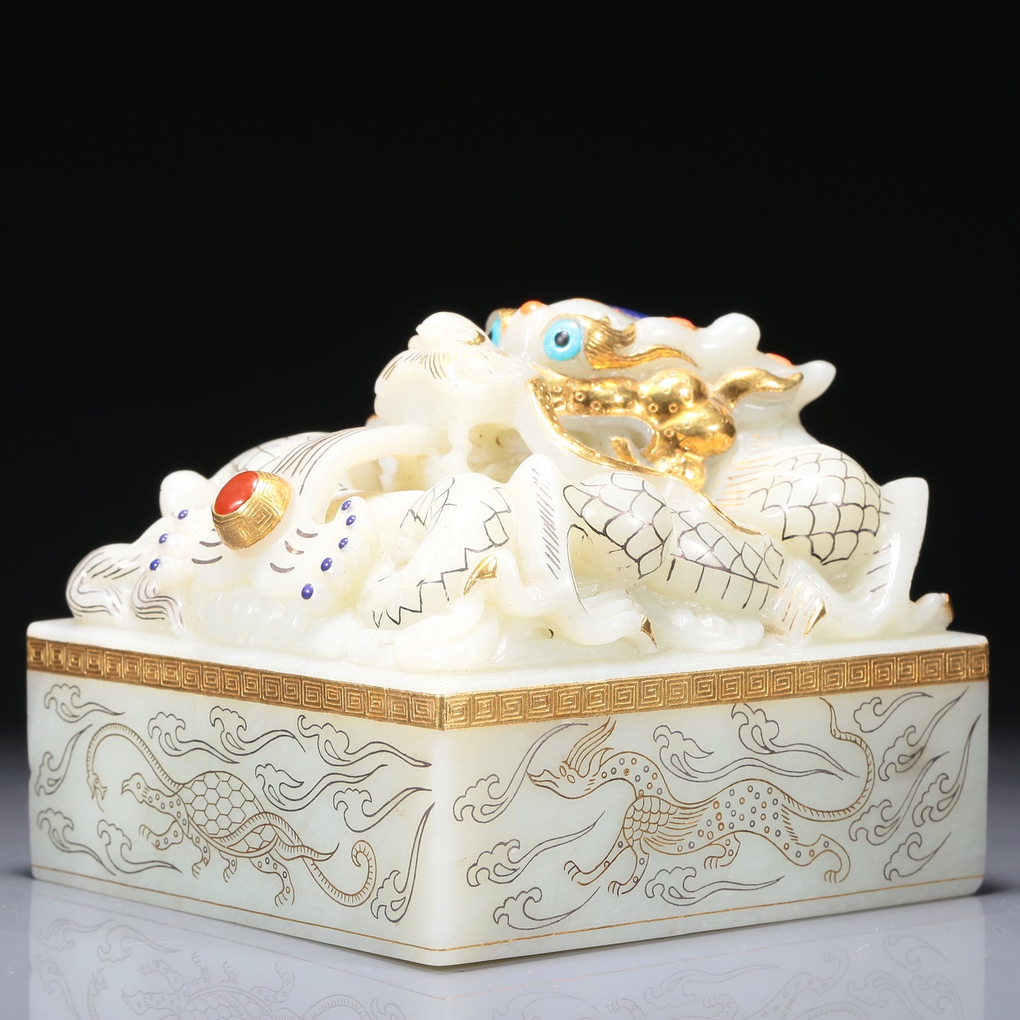 A Brilliant White Jade Gold-Mounted 'Dragon' Seal