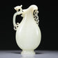 A Brilliant White Jade 'Dragon& Phoenix' Ewer