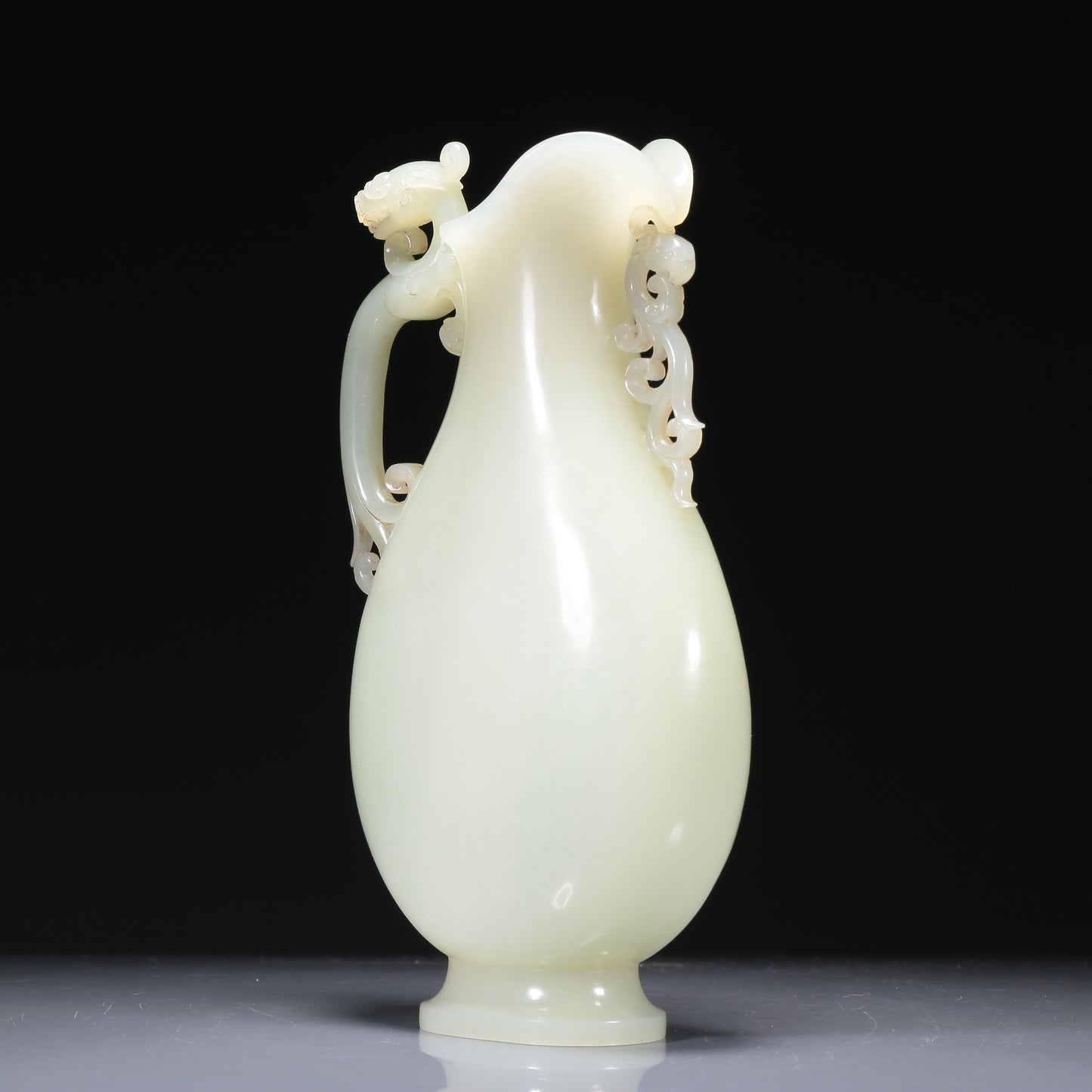 A Brilliant White Jade 'Dragon& Phoenix' Ewer