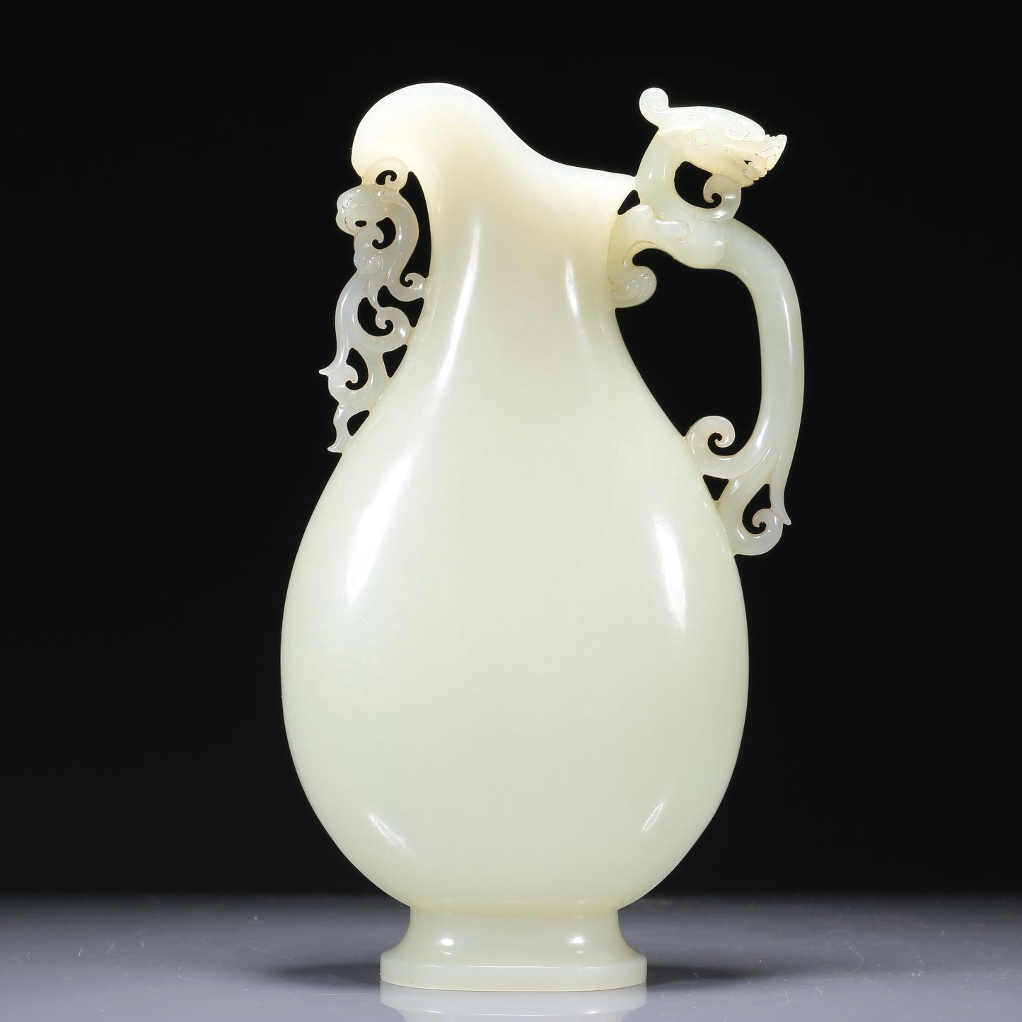 A Brilliant White Jade 'Dragon& Phoenix' Ewer