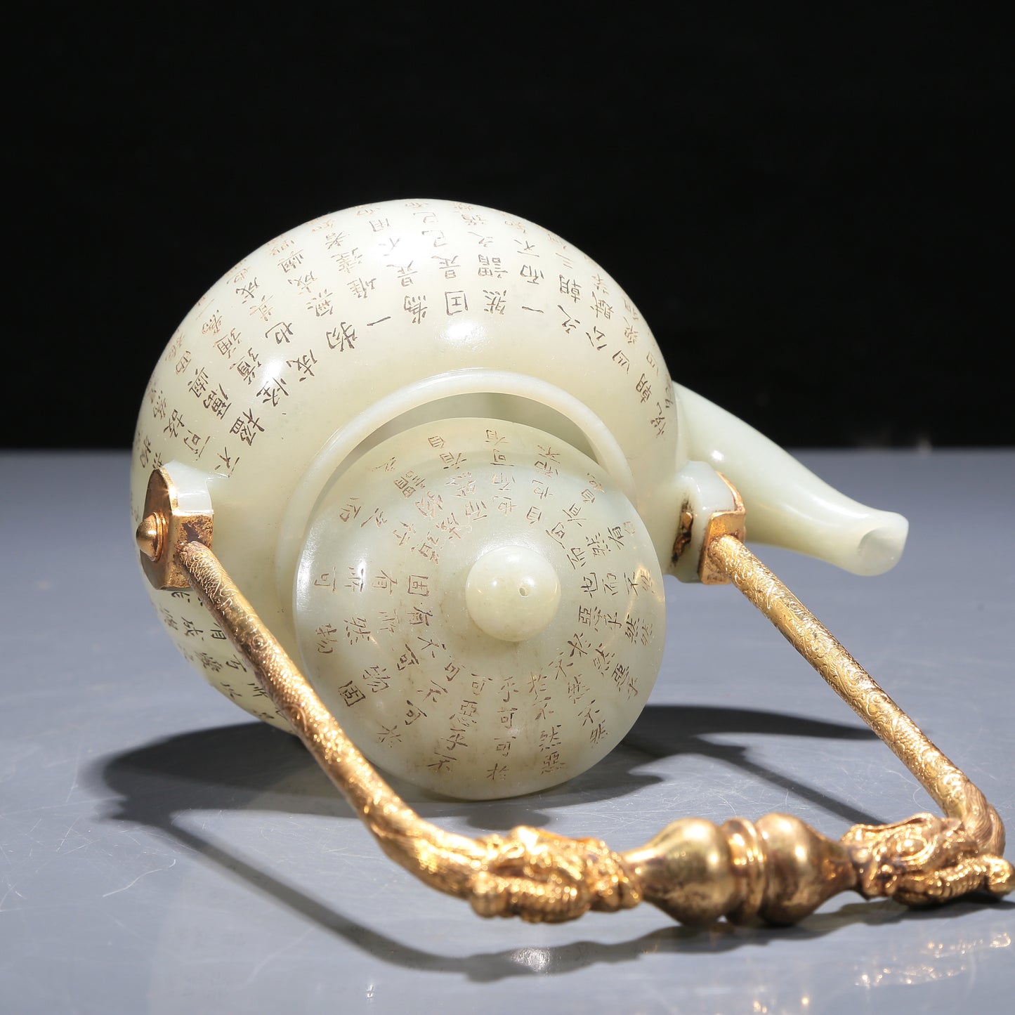 A Precious White Jade 'Poem' Teapot With A Gilt-Bronze 'Dragon' Handle And Stand