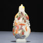 A Precious White Jade Gem-Inlaid 'Bat' Gourd-Form Vase