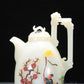 A Precious White Jade Gem-Inlaid 'Figure' Ewer