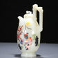 A Precious White Jade Gem-Inlaid 'Figure' Ewer