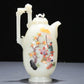 A Precious White Jade Gem-Inlaid 'Figure' Ewer