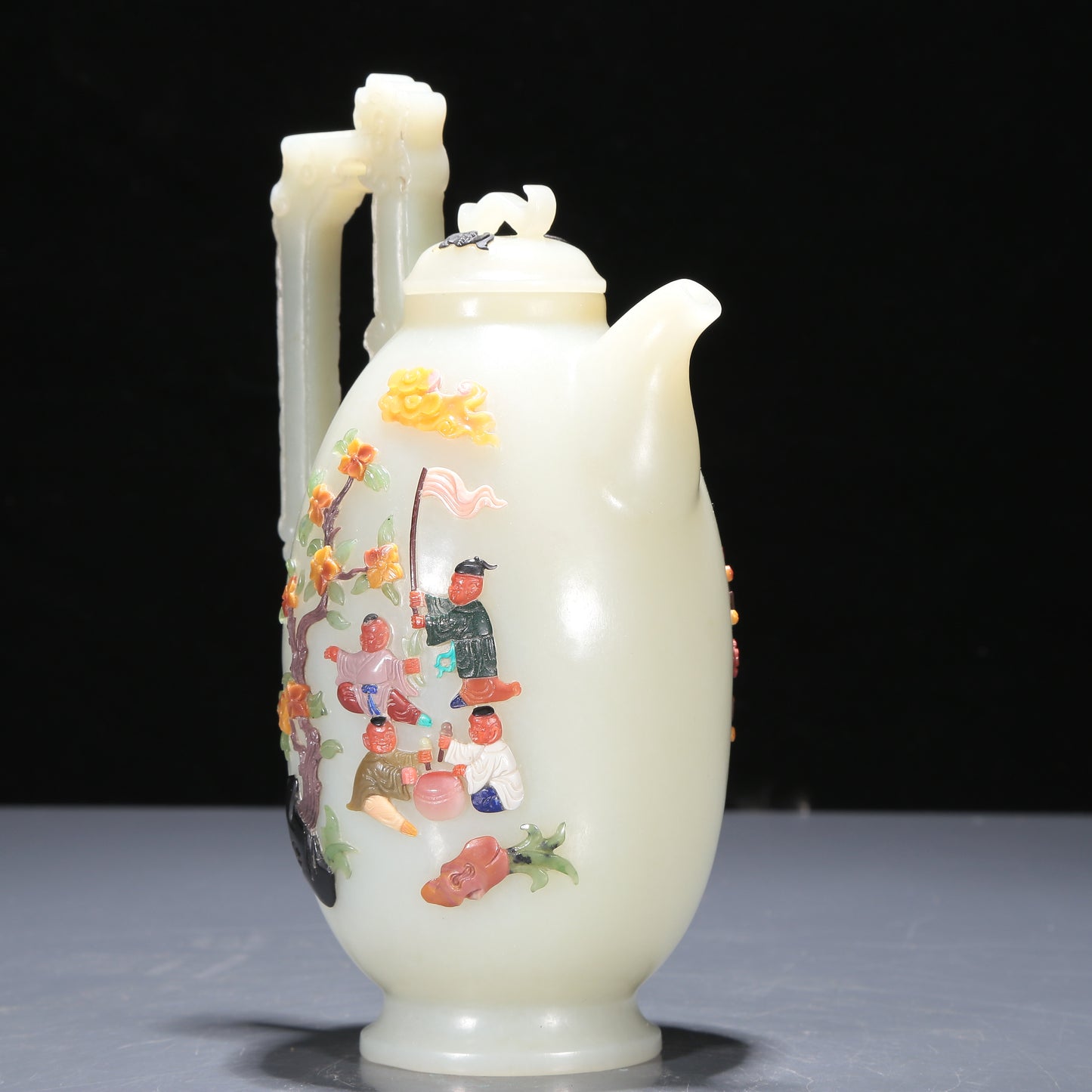 A Precious White Jade Gem-Inlaid 'Figure' Ewer