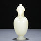 A Precious White Jade Elephant-Handled Vase And Cover