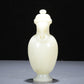 A Precious White Jade Elephant-Handled Vase And Cover