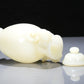 A Precious White Jade Elephant-Handled Vase And Cover