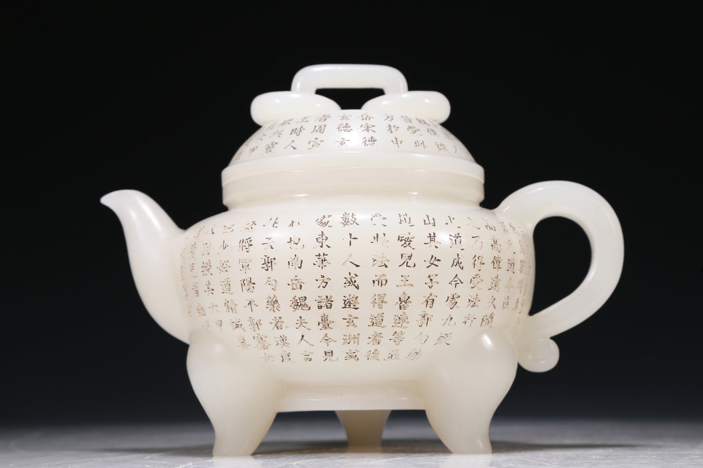 A Marvelous White Jade 'Poem' Tripod Ewer