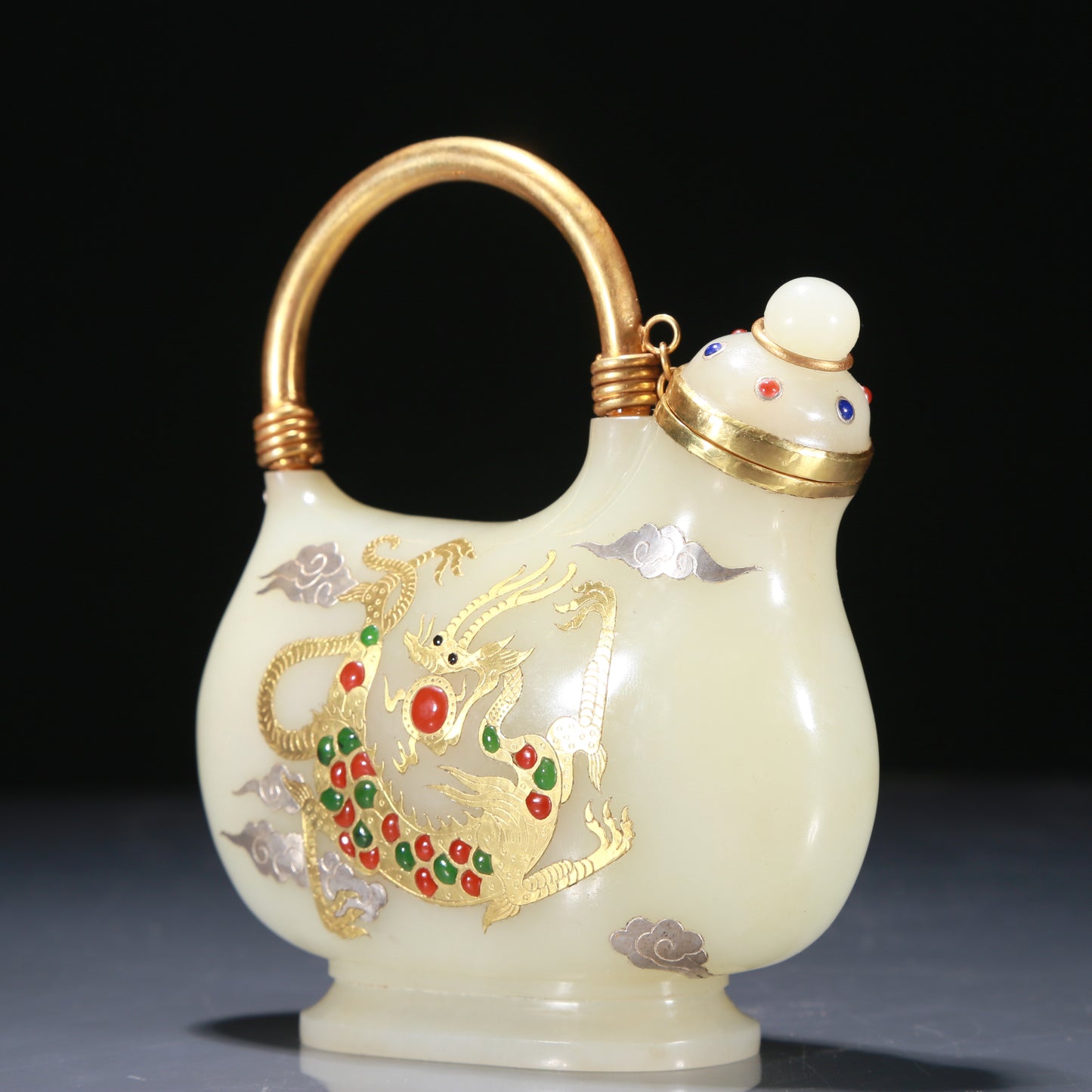 A Superb White Jade Gold-Mounted 'Dragon& Auspicious Dragon' Ewer