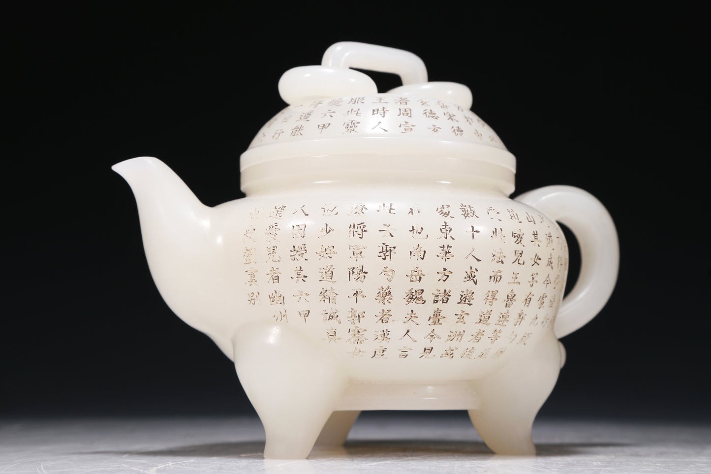 A Marvelous White Jade 'Poem' Tripod Ewer