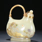 A Superb White Jade Gold-Mounted 'Immortal' Ewer