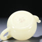 A Superb White Jade Teapot With Two Miniature Teacups