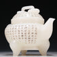 A Marvelous White Jade 'Poem' Tripod Ewer