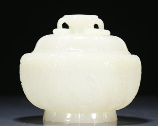 An Exquisite White Jade 'Weapons Of The Eight Immortals' Jar And Cover