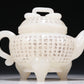 A Marvelous White Jade 'Poem' Tripod Ewer