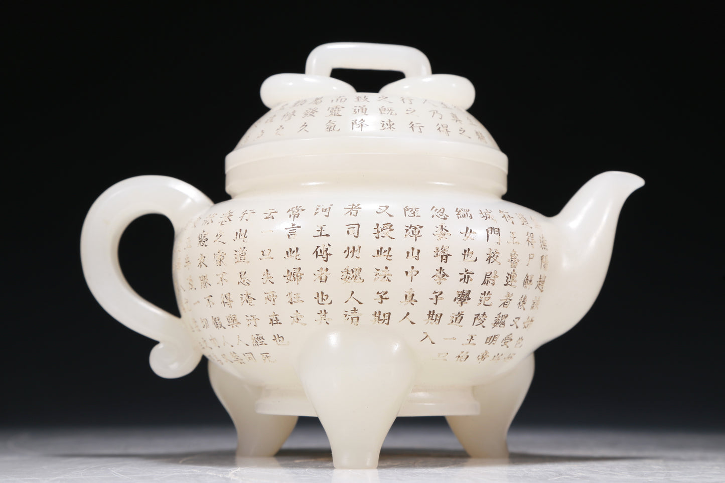 A Marvelous White Jade 'Poem' Tripod Ewer