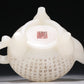 A Marvelous White Jade 'Poem' Tripod Ewer