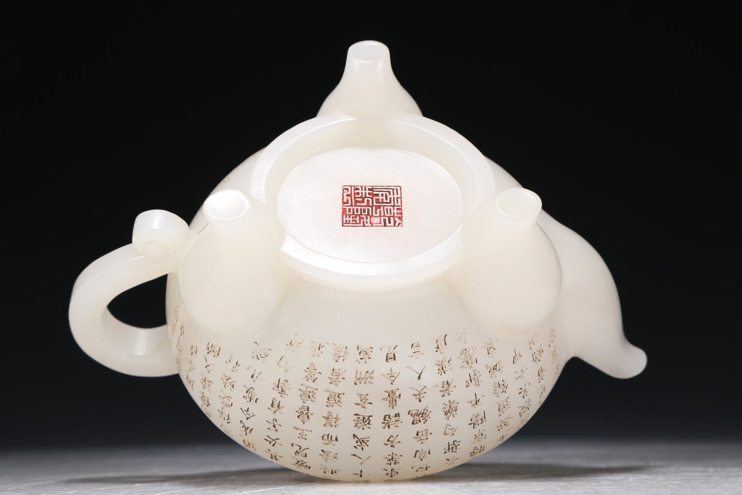 A Marvelous White Jade 'Poem' Tripod Ewer