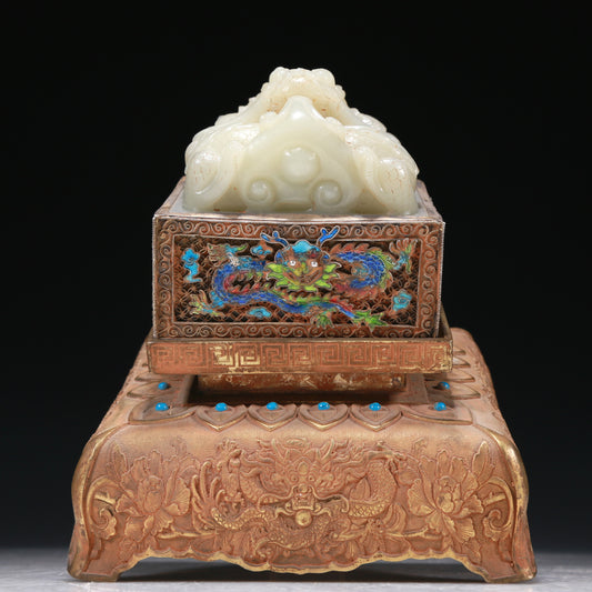 A Marvelous White Jade Gold-Mounted Blueing 'Dragon' Seal With A Gilt-Bronze 'Scrolling Lotus& Dragon' Handle And Stand