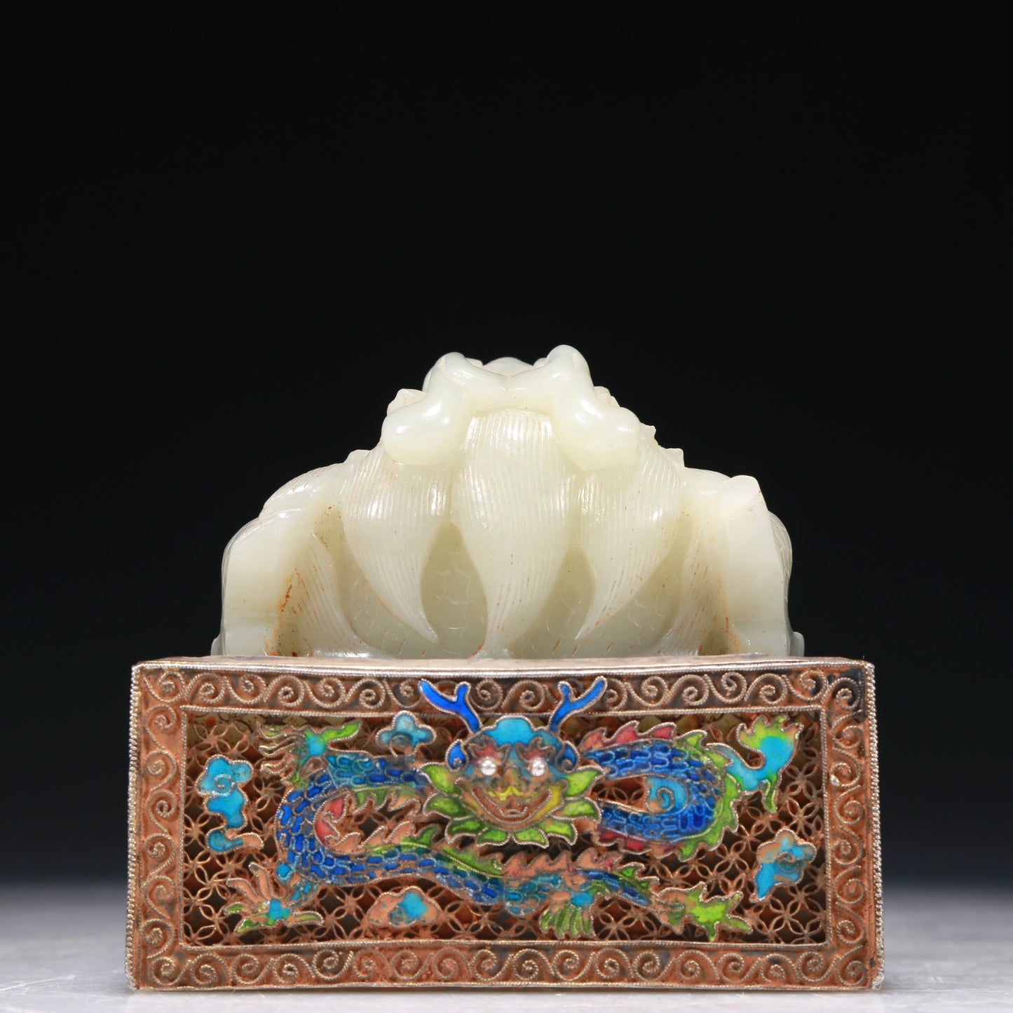 A Marvelous White Jade Gold-Mounted Blueing 'Dragon' Seal With A Gilt-Bronze 'Scrolling Lotus& Dragon' Handle And Stand