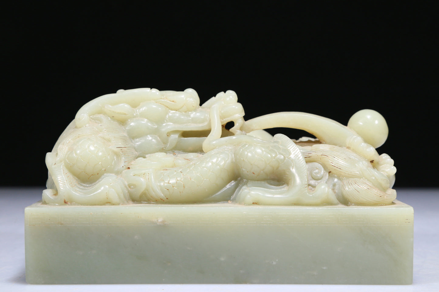 An Exquisite White Jade 'Dragon& Auspicious Cloud' Seal