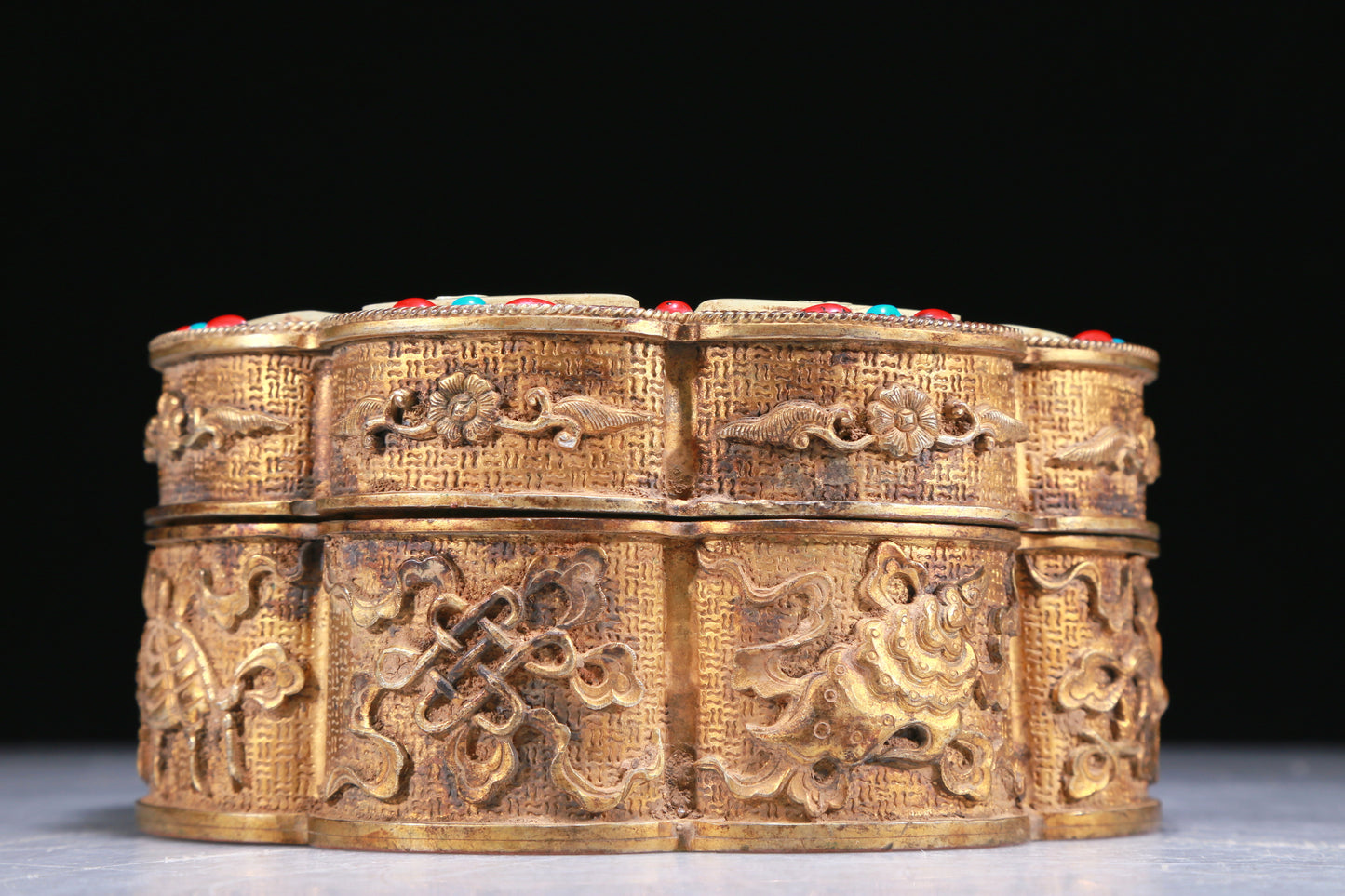 An Elaborate Gilt-Bronze White Jade-Inlaid 'Weapons Of The Eight Immortals' Box