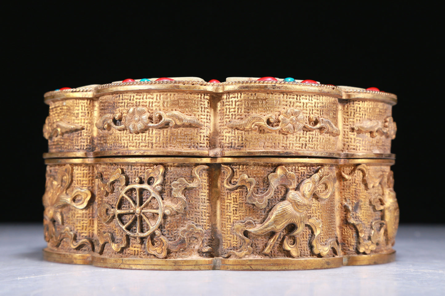 An Elaborate Gilt-Bronze White Jade-Inlaid 'Weapons Of The Eight Immortals' Box