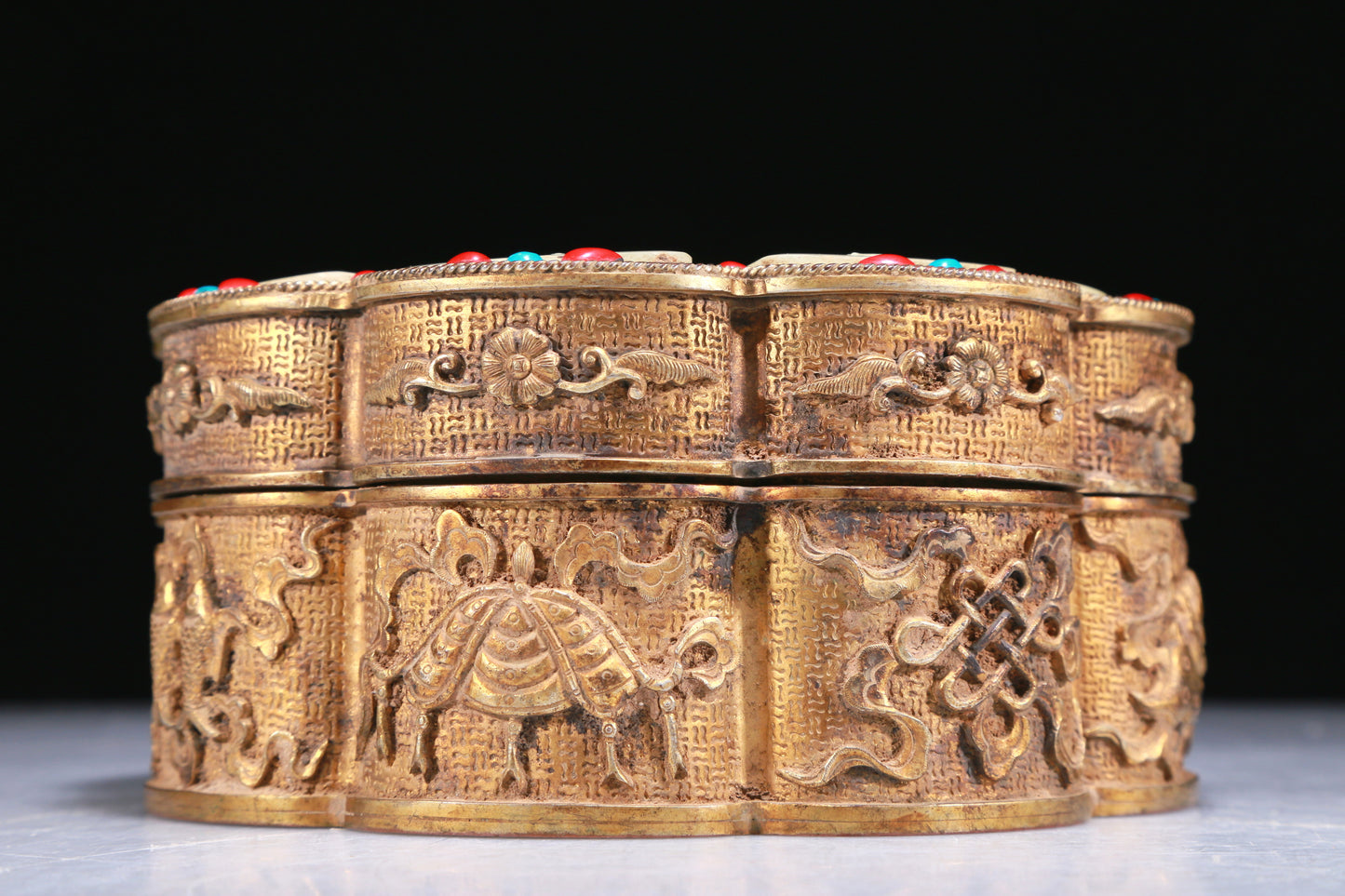 An Elaborate Gilt-Bronze White Jade-Inlaid 'Weapons Of The Eight Immortals' Box