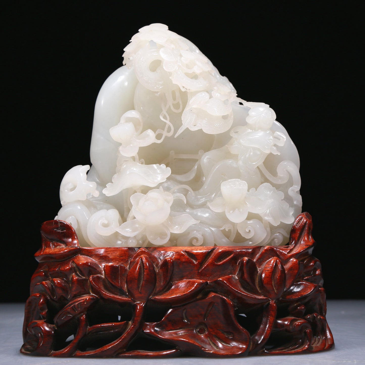 An Elaborate White Jade 'Figure' Decoration