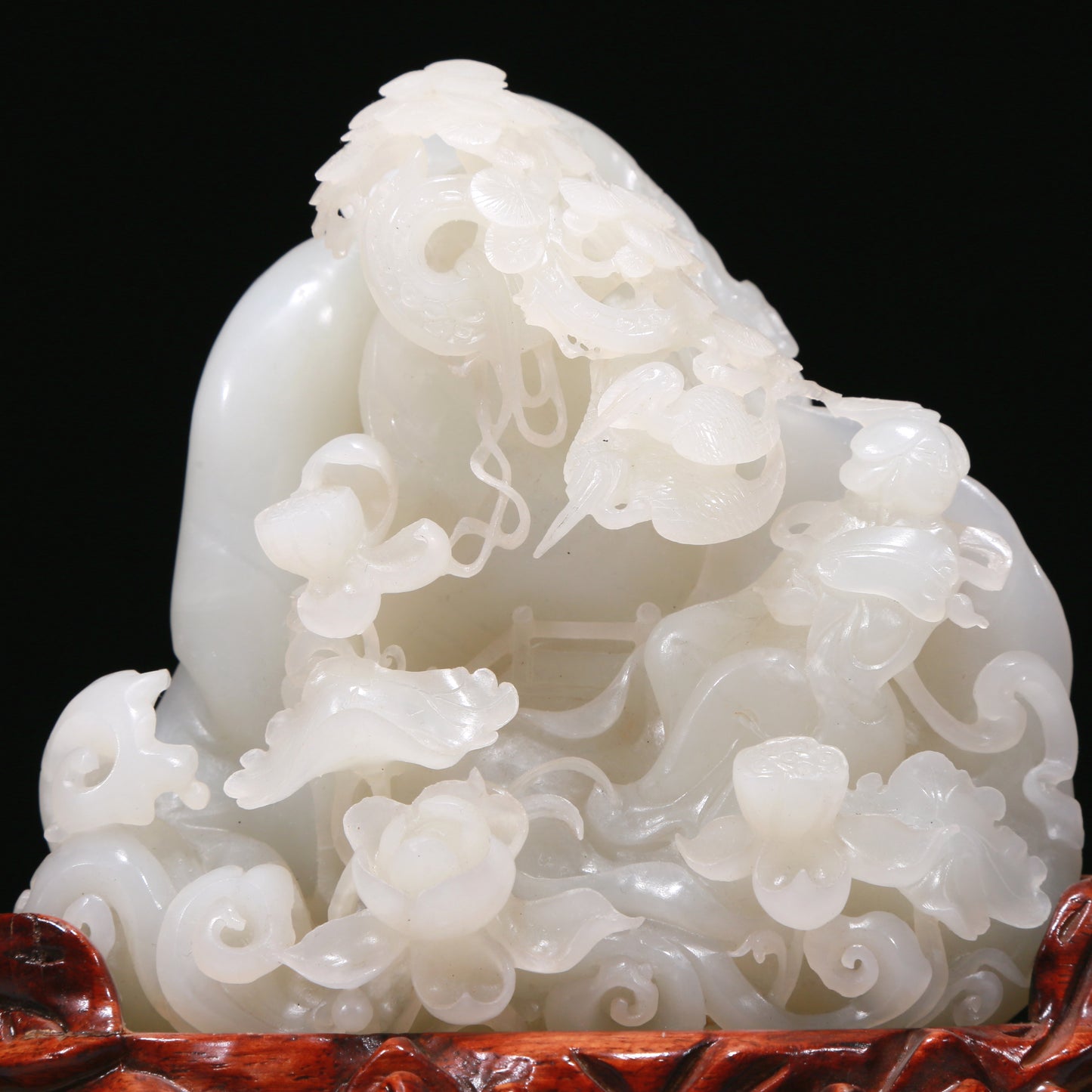 An Elaborate White Jade 'Figure' Decoration