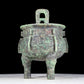 A precious bronze animal-faced two-eared and tripod furnace