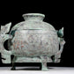 A precious bronze two-eared tripod furnace with auspicious animal patterns and a lid