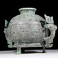 A precious bronze two-eared tripod furnace with auspicious animal patterns and a lid