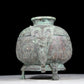 A precious bronze two-eared tripod furnace with auspicious animal patterns and a lid