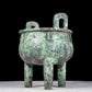 A precious bronze animal-faced two-eared and tripod furnace