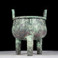 A precious bronze animal-faced two-eared and tripod furnace