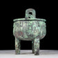 A precious bronze animal-faced two-eared and tripod furnace