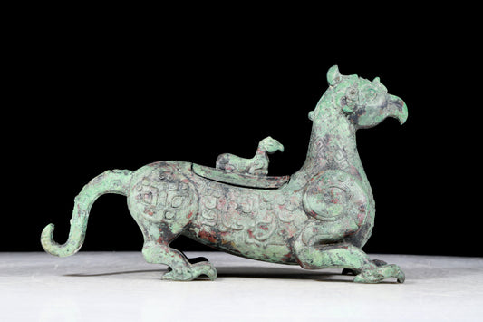 A precious bronze auspicious animal ornament