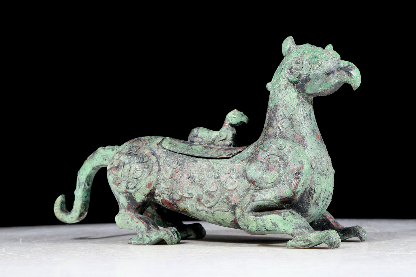 A precious bronze auspicious animal ornament