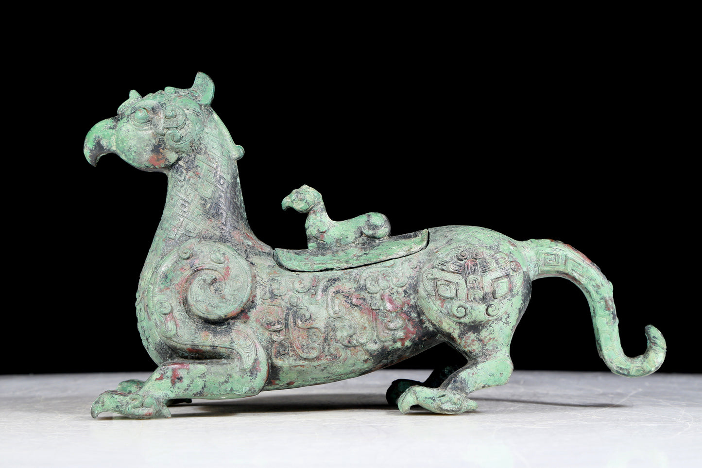 A precious bronze auspicious animal ornament