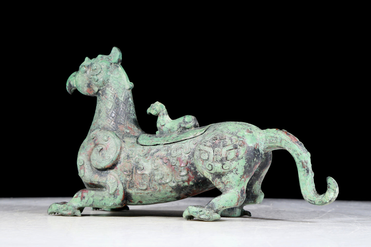 A precious bronze auspicious animal ornament