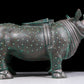 A precious bronze rhinoceros jar inlaid with gold and silver