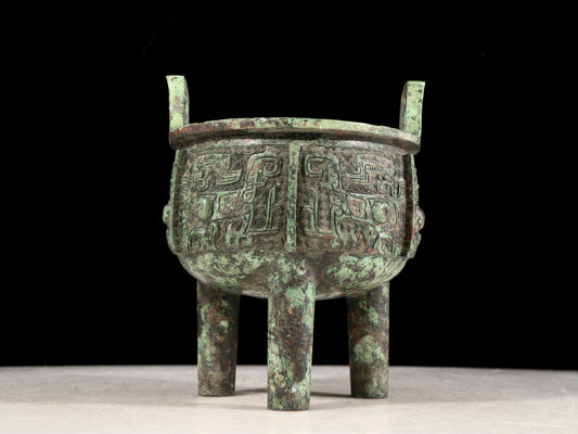 A precious bronze animal-faced two-eared and tripod censer