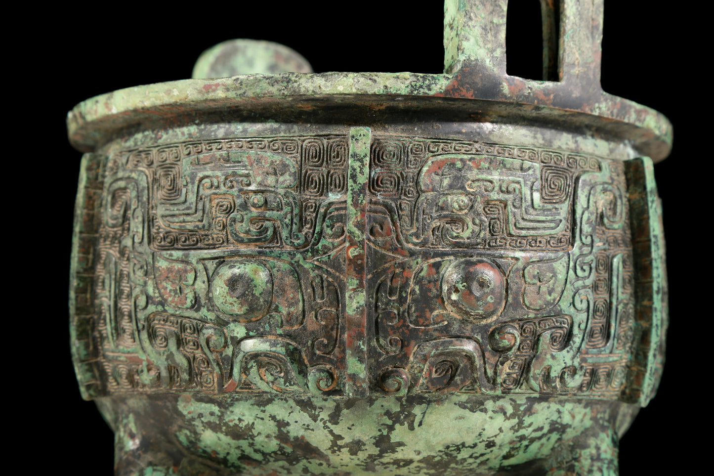 A precious bronze animal-faced two-eared and tripod censer